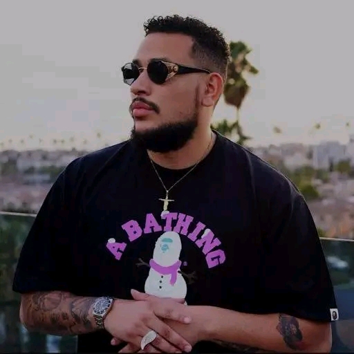 Two Brothers Charged with Killing South African Rapper